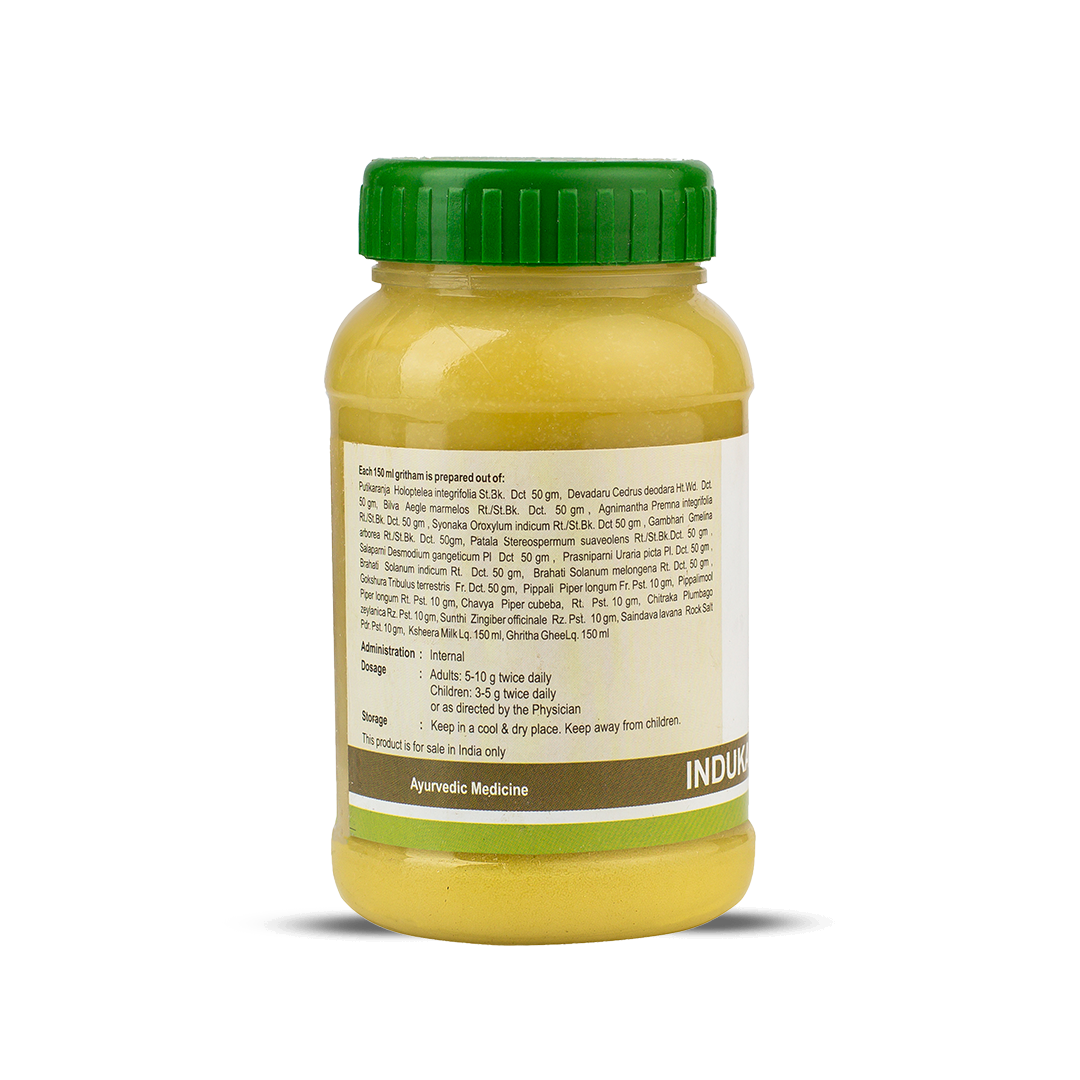 Side view of the Indukantha Ghritham jar, showing a detailed list of ingredients prepared per 100 gm, including administration, dosage (5-10 g twice daily for adults), and storage instructions. – Kerala Ayurveda India