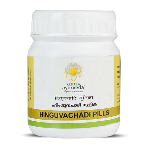 White plastic jar of Hinguvachadi Pills with Kerala Ayurveda lotus logo on front, lime-green and gold accent band and Malayalam script beneath the English name – Kerala Ayurveda India