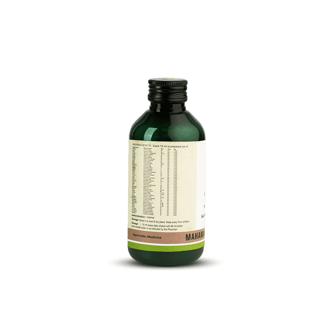 Side view of the dark green glass bottle of Kerala Ayurveda Mahamanjishtadi Kwath, showing a detailed list of ingredients prepared per 15 ml, and administration, dosage (15 ml twice daily diluted with 60 ml water), and storage instructions. – Kerala Ayurveda India