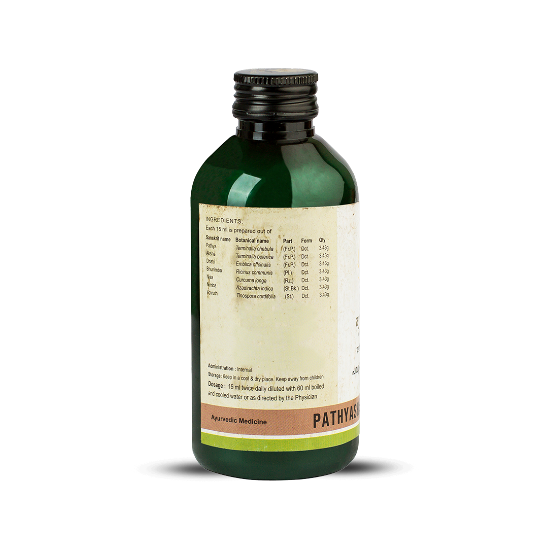 Side view of the dark green glass bottle of Kerala Ayurveda Pathyashadangam Kwath, showing a detailed list of ingredients prepared per 10 ml, and administration, dosage (15 ml twice daily diluted with 60 ml water), and storage instructions. – Kerala Ayurveda India