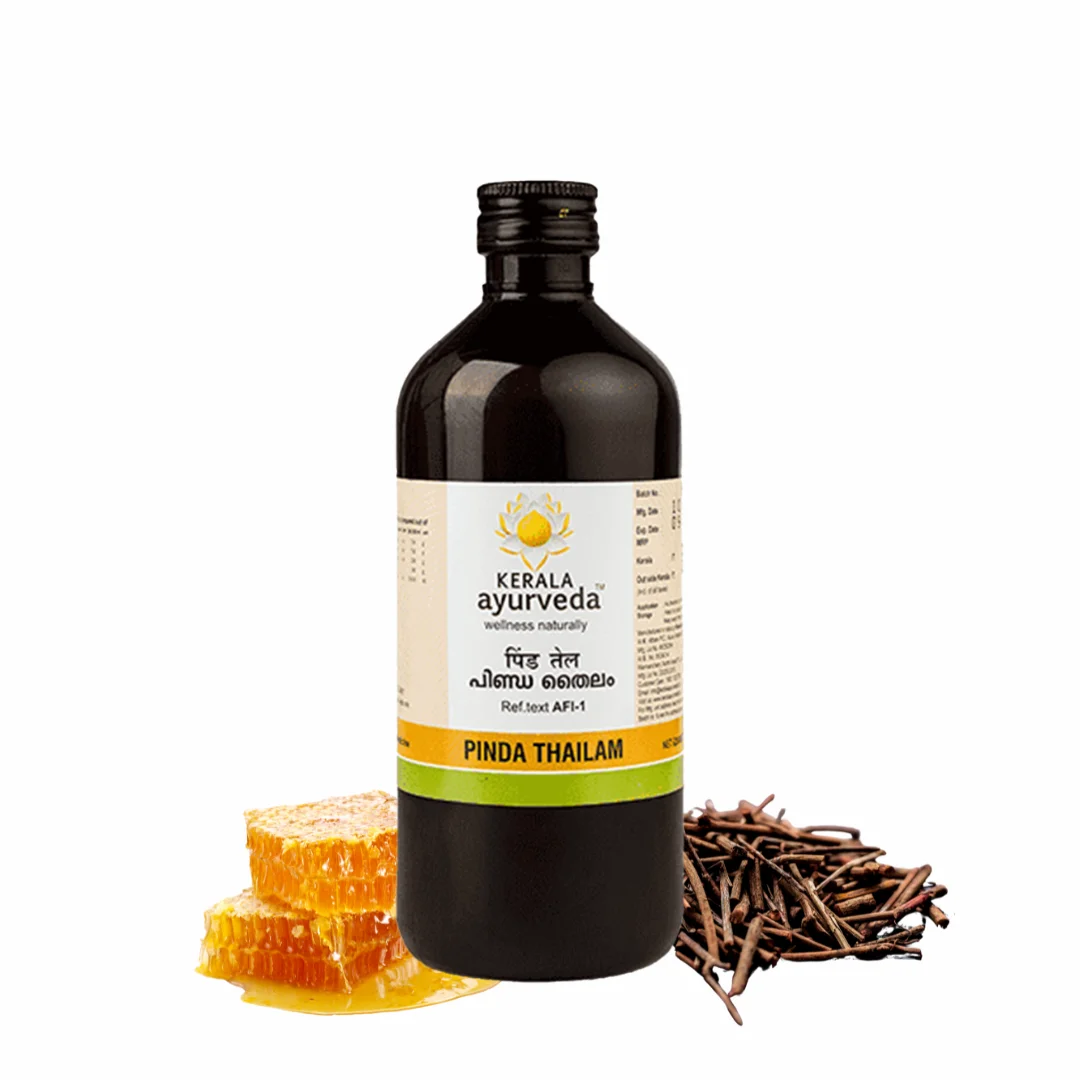 Hero image of Kerala Ayurveda Pinda Thailam bottle flanked by honeycomb and manjishta roots, emphasising its cooling, anti-inflammatory base – Kerala Ayurveda India