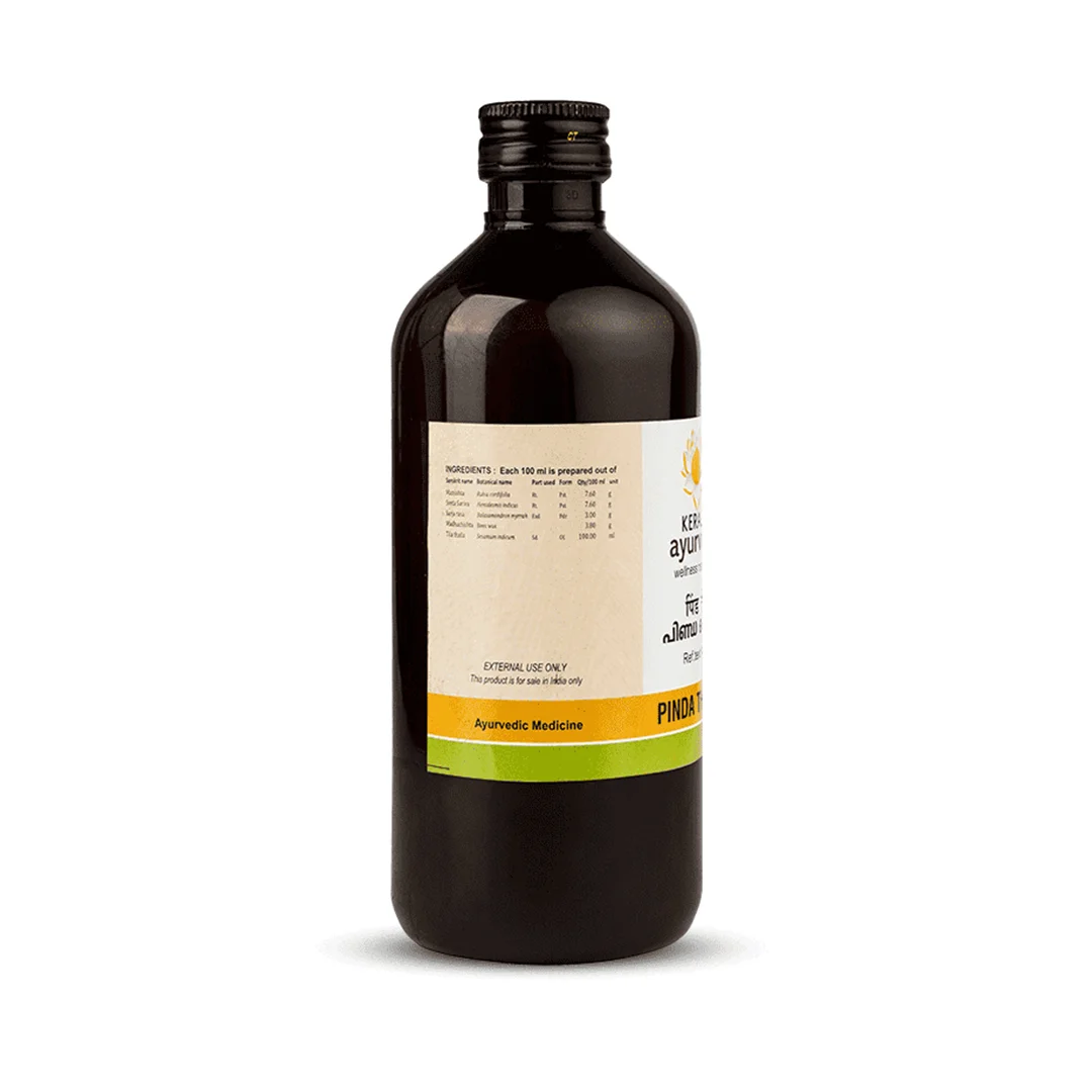Side view of Kerala Ayurveda Pinda Thailam 200 ml bottle displaying formulation breakdown and dosage panel – Kerala Ayurveda India