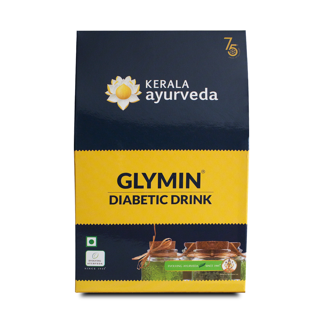 Front view of the Kerala Ayurveda Glymin Diabetic Drink box, with a dark blue and yellow design. It prominently displays "GLYMIN® DIABETIC DRINK" and the Kerala Ayurveda logo, along with illustrations of ingredients in jars. – Kerala Ayurveda India