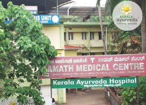 Signage of Samath Medical Centre and Kerala Ayurveda Hospital amidst greenery in Kerala.