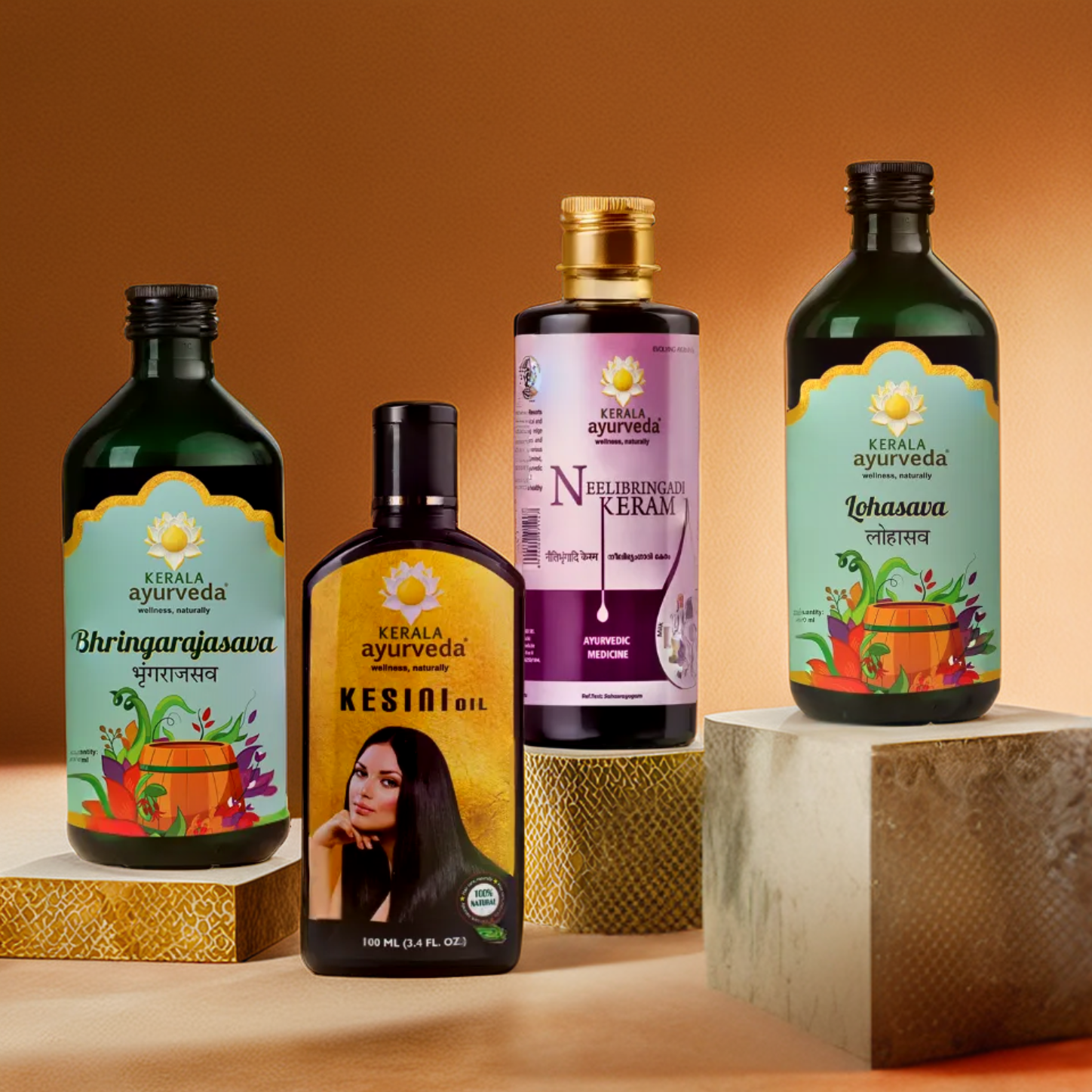 Four bottles of Kerala Ayurveda products displayed on geometric pedestals against a neutral background.
