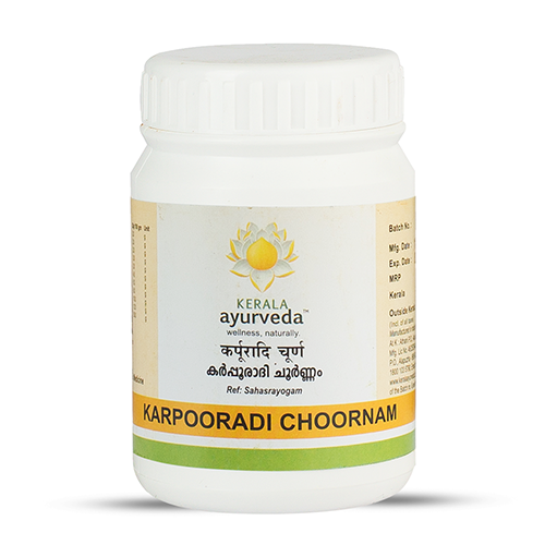 Front view of a white plastic jar of Kerala Ayurveda Karpooradi Choornam, with a white lid and a label displaying the product name in English and Malayalam script, along with the Kerala Ayurveda logo. – Kerala Ayurveda India