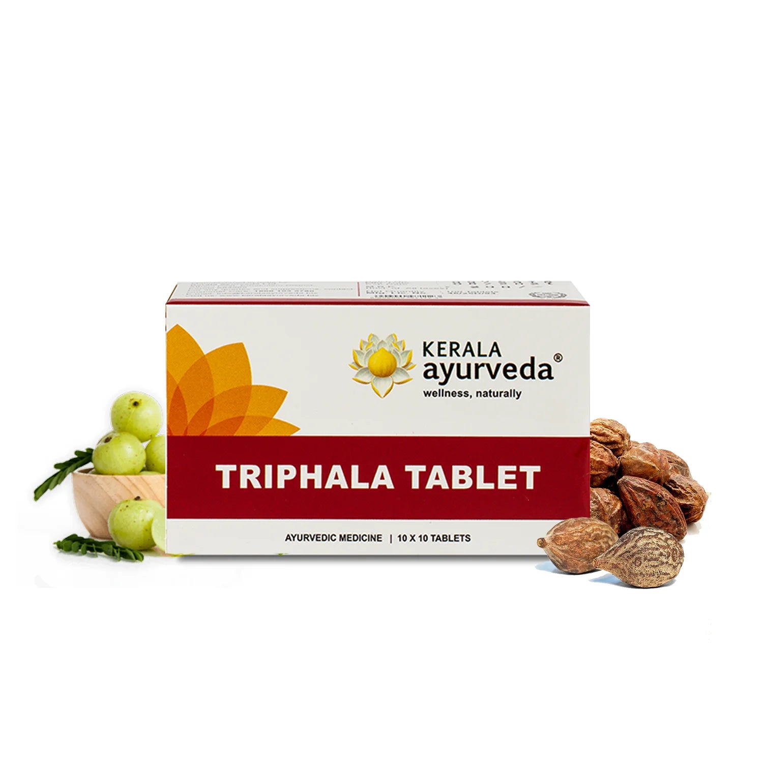 Front pack shot of Kerala Ayurveda Triphala Tablet flanked by amalaki and haritaki fruits – Kerala Ayurveda India