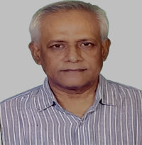 A middle-aged man with gray hair wearing a striped shirt against a light gray background.